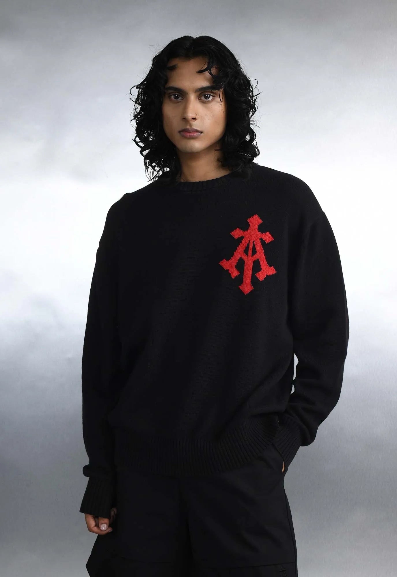 Alpha Cross Knit Sweater In Black