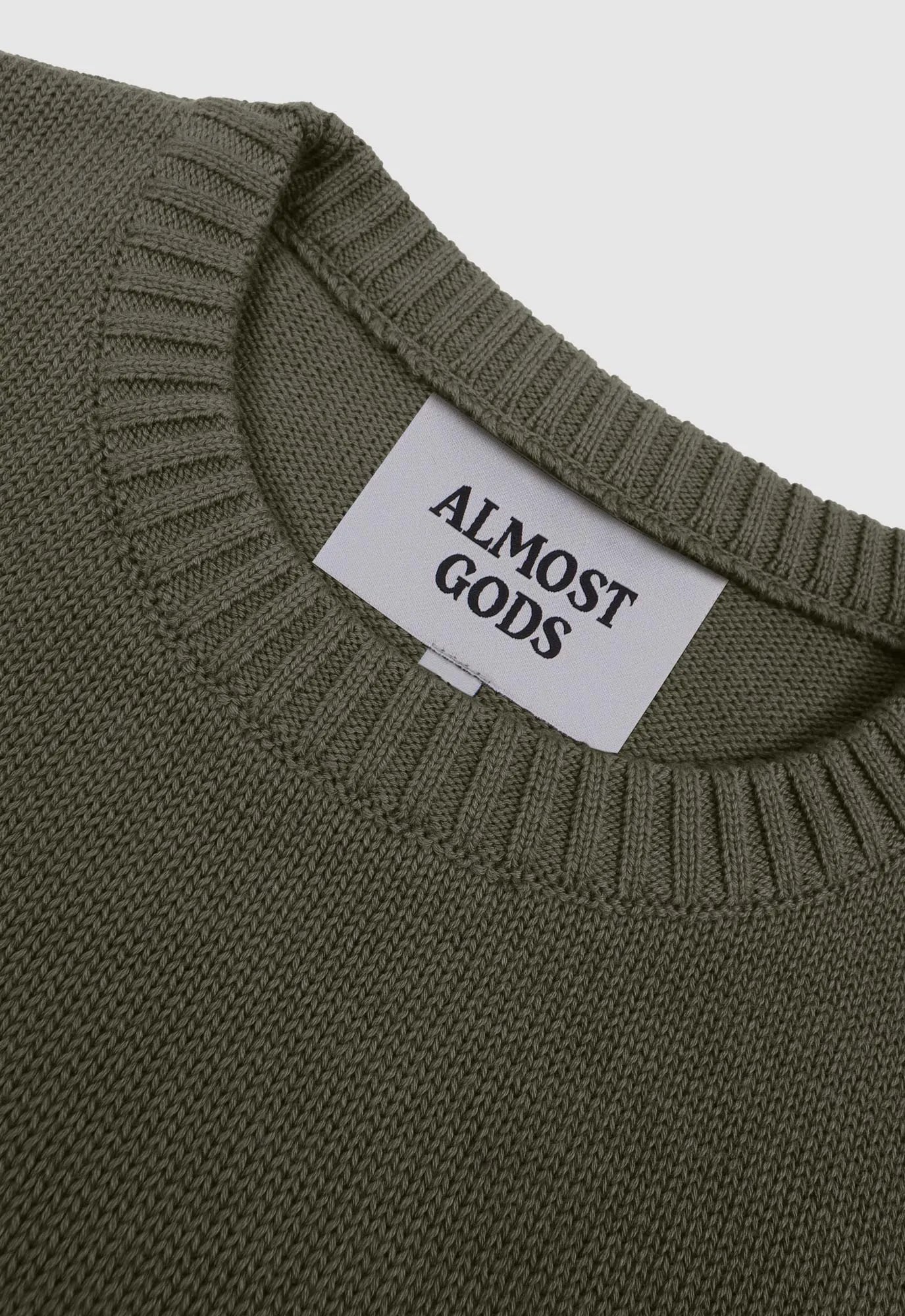 Alpha Cross Knit Sweater In Olive