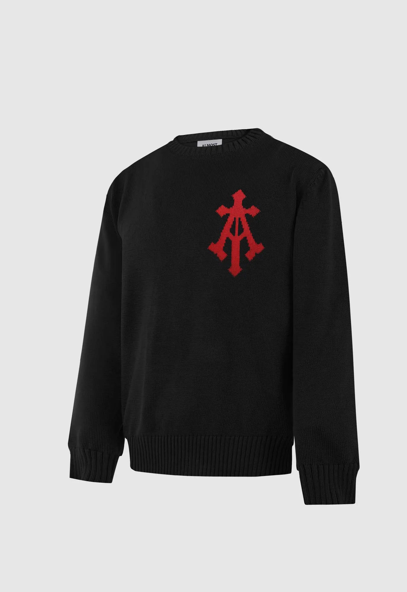 Alpha Cross Knit Sweater In Black