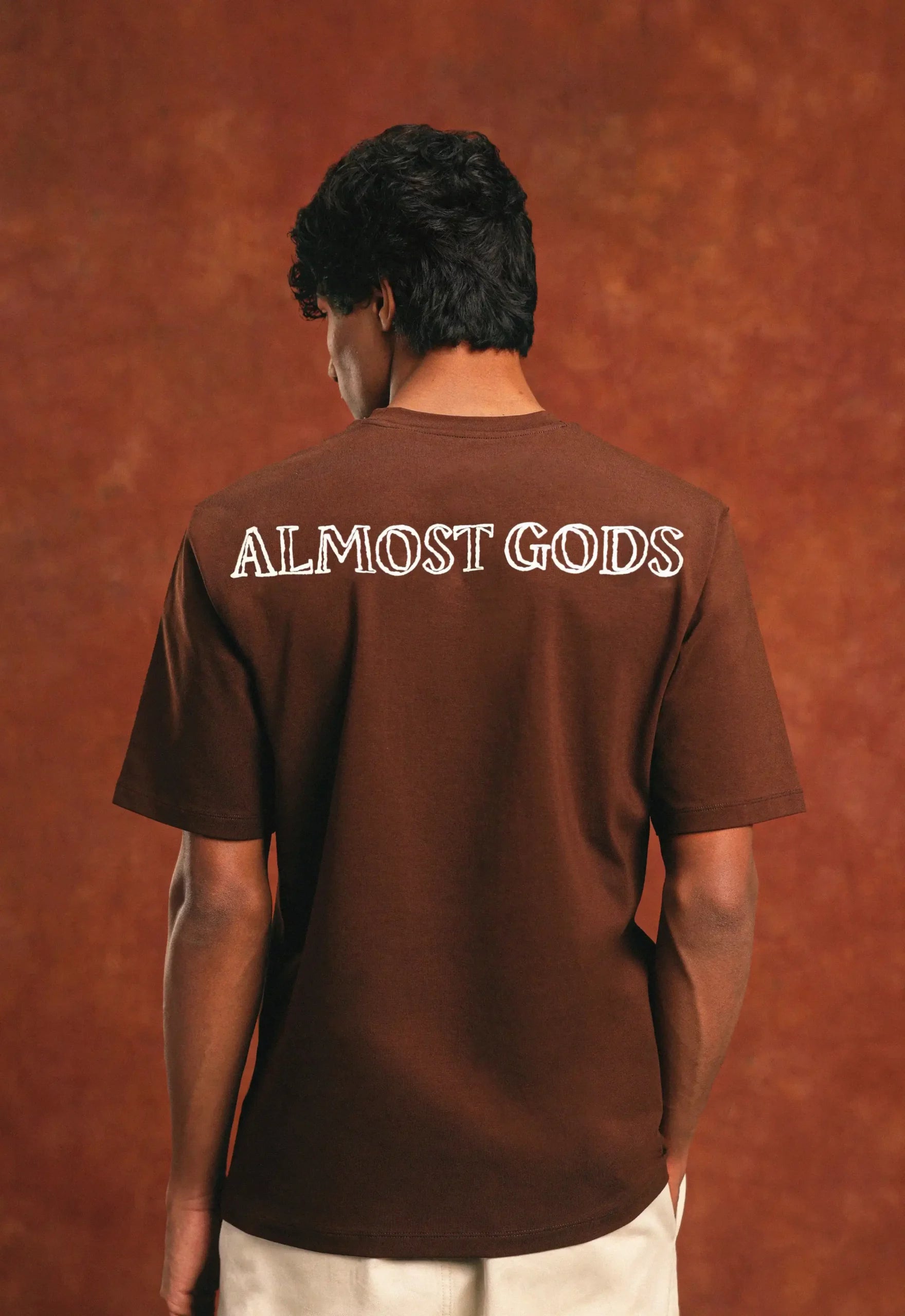 Alpha Cross Chain Link Relaxed Tee In Brown